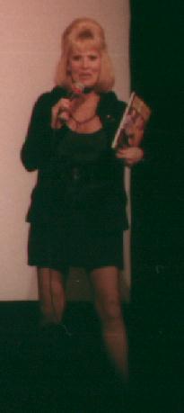 Grace Lee Whitney with book