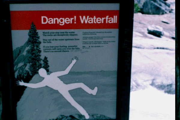 Danger! Waterfall sign at top of falls